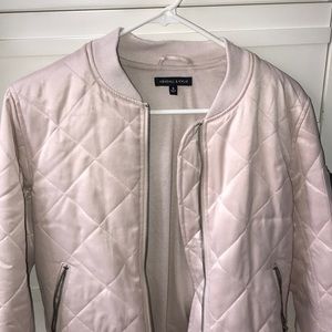 Satin pale pink bomber jacket.